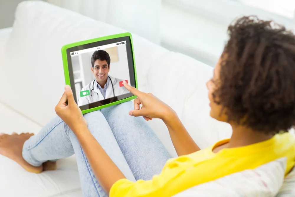 girl watching tablet